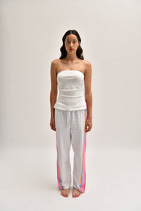 Front image of pink cotton trousers with a relaxed, lightweight fit, styled to resemble linen.
