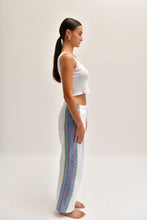 Load image into Gallery viewer, Side image of blue and white cotton trousers with a relaxed, linen-style fit.
