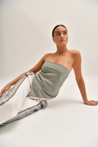 Front image of a cream and khaki cotton scarf top styled as a crop, shown as part of a matching set.