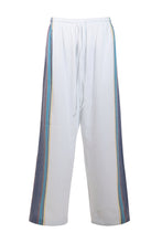 Load image into Gallery viewer, Product image of blue and white cotton trousers with a relaxed, linen-style fit.
