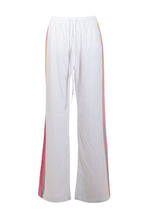 Load image into Gallery viewer, Product image of pink cotton trousers with a relaxed, lightweight fit, styled to resemble linen.
