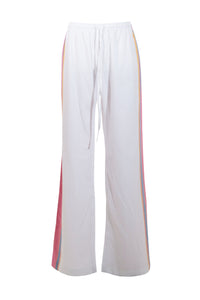 Product image of pink cotton trousers with a relaxed, lightweight fit, styled to resemble linen.